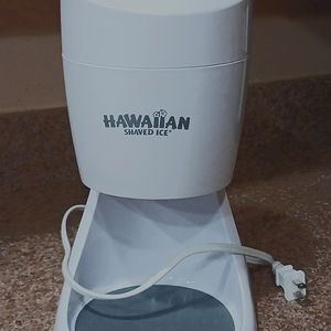This is a Hawaiian snow cone machine! Rarely used and easy to make!